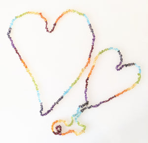Semi-precious stones in chakra alignment to bring joy.  Rainbow Pride necklace. 34 inches long. All stones, no clasp. 